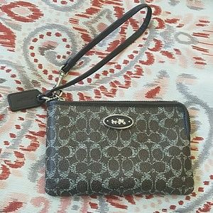 Authentic Coach Signature Monogram Strap wristlet - 100% authentic